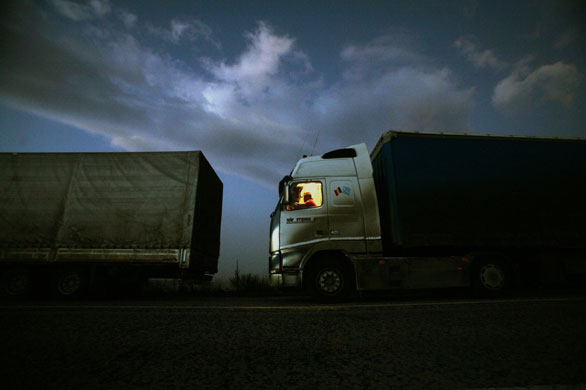 Gallery 27 January 2009: Kulata, Bulgaria: A driver in his truck while waiting to pass the border