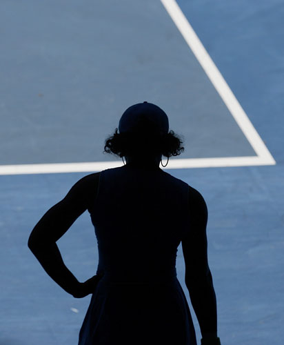 Gallery aus open 2009 day 10: Serena Williams of the U.S. is silhouetted 