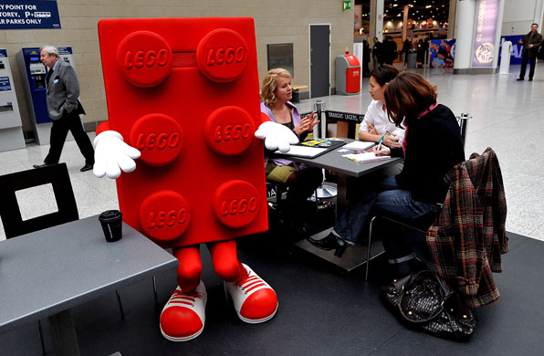 Gallery Toy Fair 2009: A Lego man takes some time out for a cup of coffee at the Toy Fair 2009.