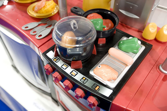 Gallery Toy Fair 2009: A toy cooker with plastic food at the Toy Fair.