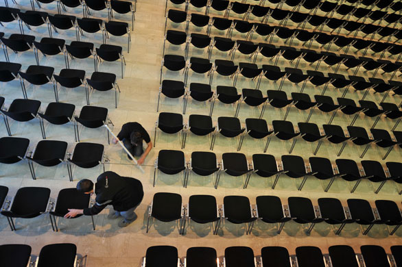 Gallery Davos: Chairs are installed in the main room at the Davos Congress Centre