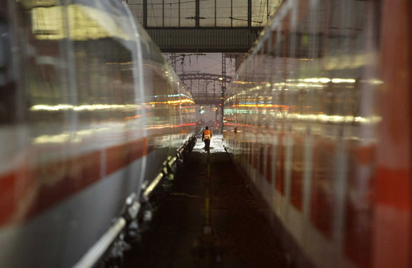 Gallery 29 January 2009: Munich: A worker walks between trains during a one-day warning strike