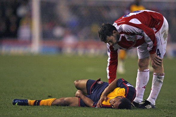 Gallery Managers Rant: Rory Delap checks on Theo Walcott after fouling him