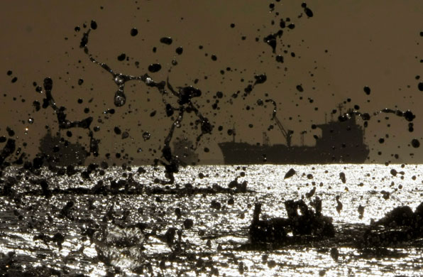 Gallery 30 January 2009: Limassol, Cyprus: A wave splashes on a rock