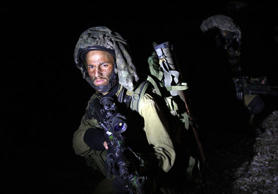 Gallery Israeli troops enter Gaza: Israeli soldiers advance near the border