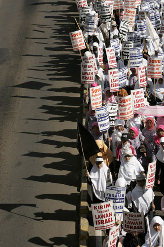 Gallery Protests against Israel: Muslim protesters march during a rally against Israeli air strikes on Gaza