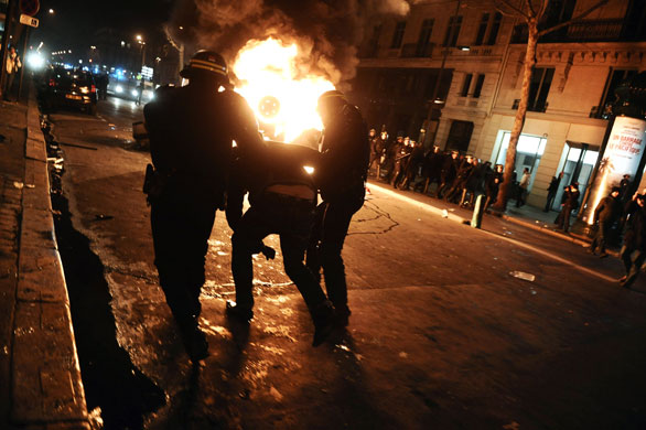 Gallery Protests against Israel: French policemen arrest a protester during a demonstration