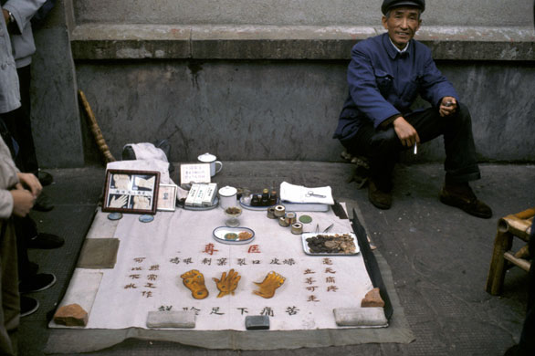 Gallery China then and now: An acupuncturist on the streets of the old city of Shanghai