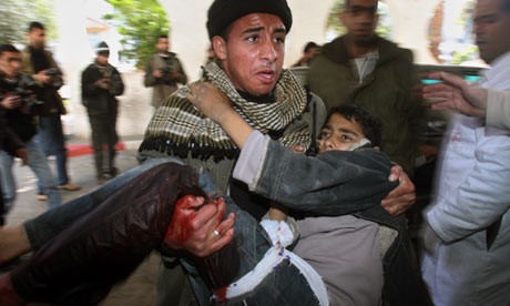 An injured Palestinian boy