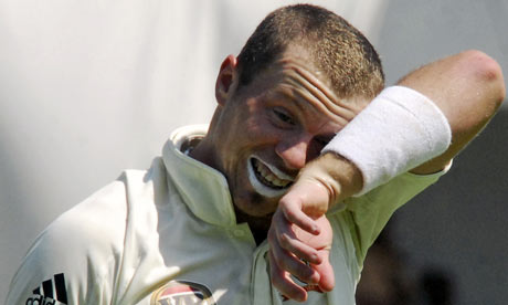 Peter Siddle wipes his face