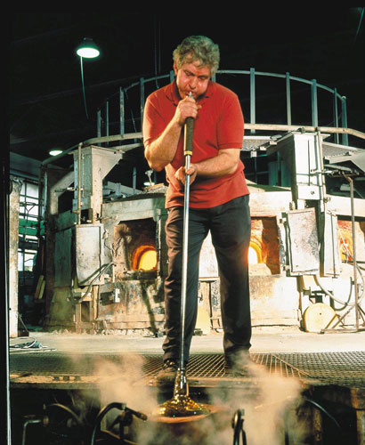 Gallery Wedgwood Waterford: Glassblower Tom Rowe blows glass at Waterford Wedgwood 