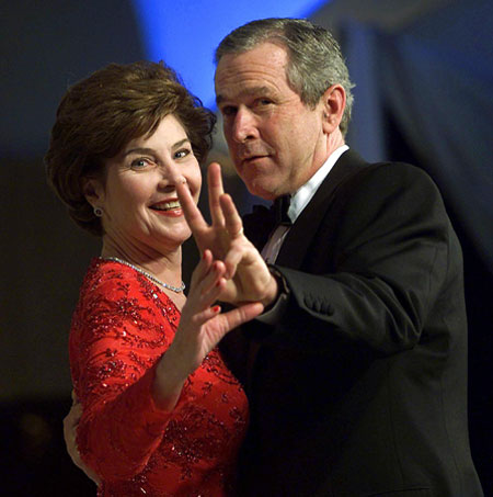 Gallery President George W Bush: US President George W. Bush (R) flashes the 'W' sign