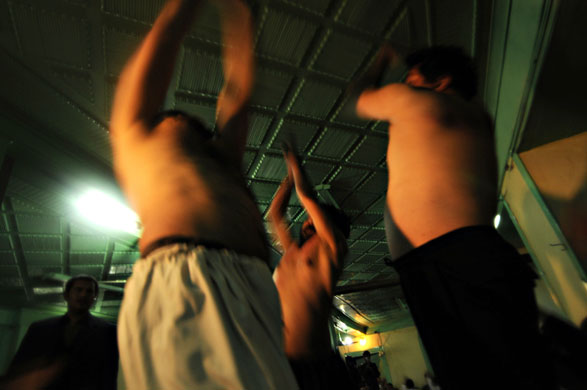 Gallery 24 hours in pictures: Kabul, Aghanistan: Shi'ite muslimstake part in Ashura at a mosque