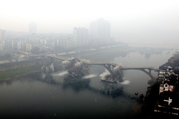 Gallery 24 hours in pictures: An old bridge across the Fujiang river bridge is demolished