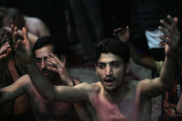 Gallery 6 January 2009: Shiite Muslims in a ceremony during the Ashura mourning period