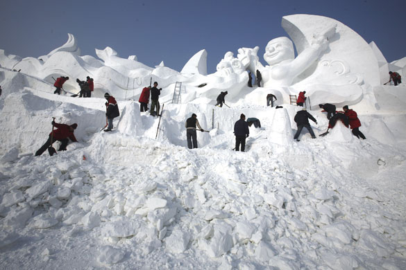Gallery Harbin: A snow sculpture takes shape at the Snow Festival in Harbin