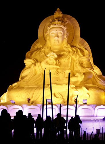 Gallery Harbin: Visitors admire the lighted ice carvings
