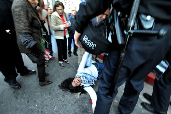 Gallery 24 hours in pictures : An anti-Israeli protester in Los Angeles: 