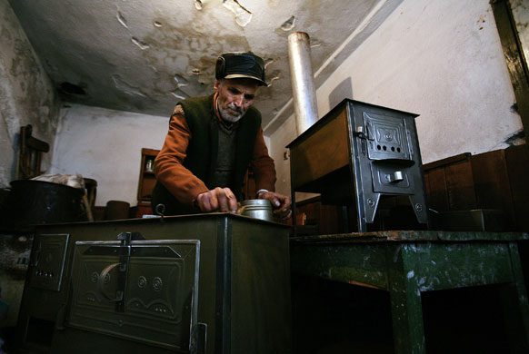 Gallery Russia Ukraine gas row: A stove handicraftsman works in his workrshop near the town of Belovo