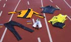 Running gear lying on an athletics track