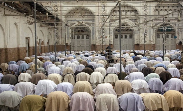 Gallery Labourers in Islamabad: Locals gather for evening prayers in Peshawar