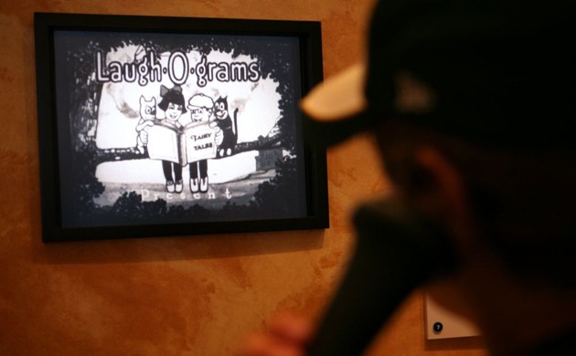 A visitor looks at an exhibit about Laugh-O-Gram studio at the Walt Disney Family Museum. Disney said he was inspired to draw Mickey Mouse after watching a rodent while working at the studio in Kansas City, Missouri