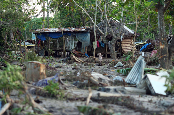 Samoa: A house remains standing following the earthquake in Lalomanu