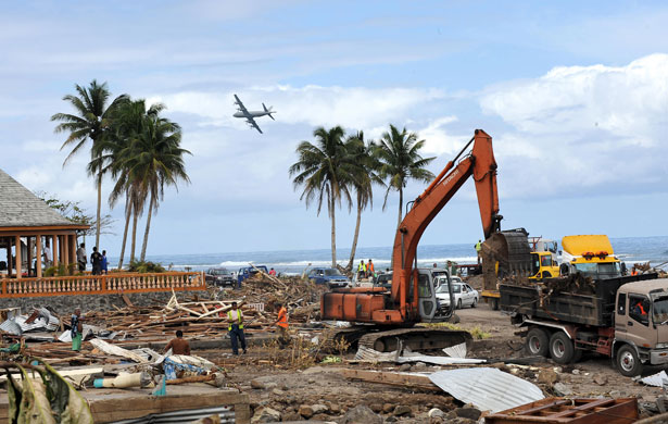Samoa: A New Zealand Air Force plane surveys the damage