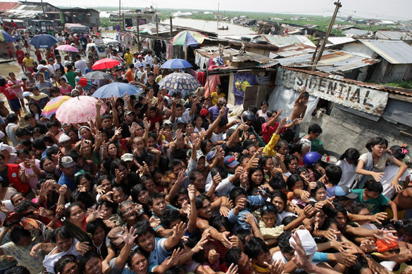 24 hours in pictures: Filipino evacuees beg for relief goods in Taytay 