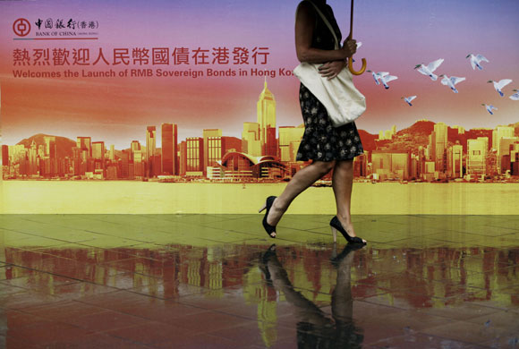 Week in Business: Billboard featuring the China RMB Sovereign Bonds in Hong Kong. 