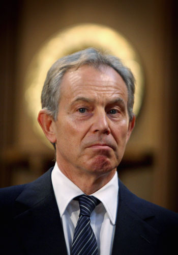 24 Hours in Pictures: Former prime minister Tony Blair during a reception at the Guildhall