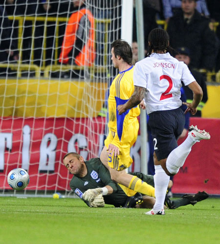 Ukraine v England: Robert Green brings down Artem Milevskiy to concede a penalty 