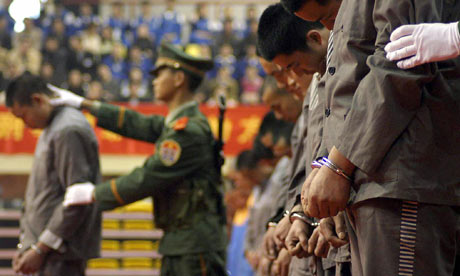 Hardcore convicts at a sentencing rally in the east Chinese city of Wenzhou, 7 April 2004
