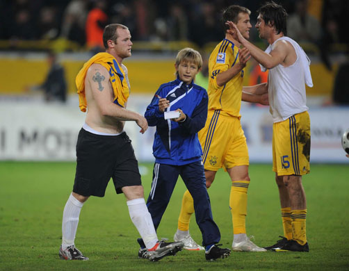 Ukraine v England: Dejected Wayne Rooney is asked for an autograph