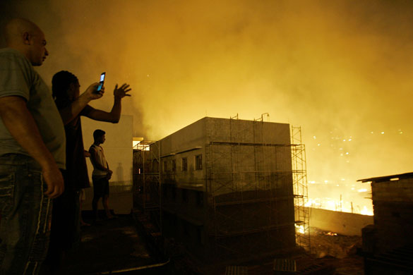 Sao Paulo Brazil fire: People take pictures during a fire in Sao Paulo