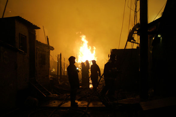 Sao Paulo Brazil fire: Firefighters work during a fire.