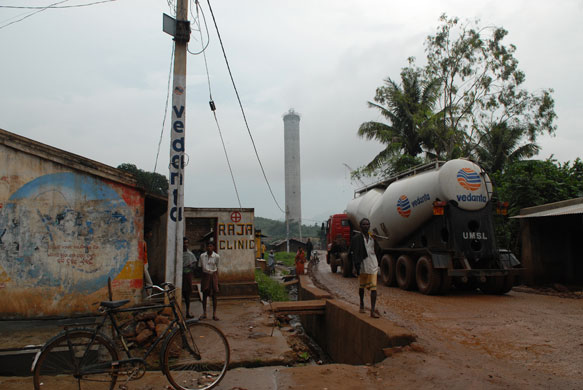 Vedanta in India: A vehicle belonging to the Vedanta company drives through a village 