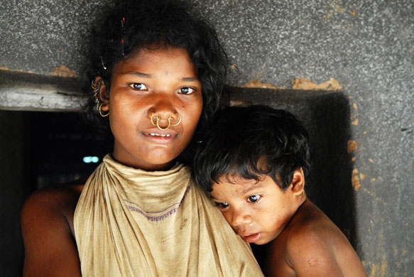 Vedanta in India: A member of the Dongria Kondh tribe and her child in Patalamba