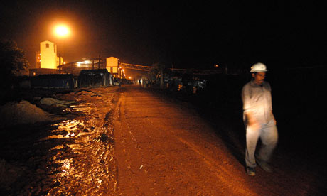 A worker leaves the Vedanta company's Lanjigarh alumina refinery