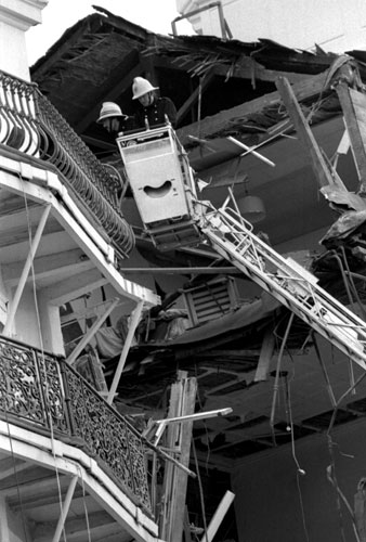 Brighton bombing 1984: Firemen inspect the wreckage at the Grand Hotel 