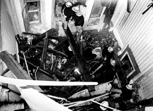 Brighton bombing 1984: Firemen working in the wreckage where victims of the IRA bomb were found