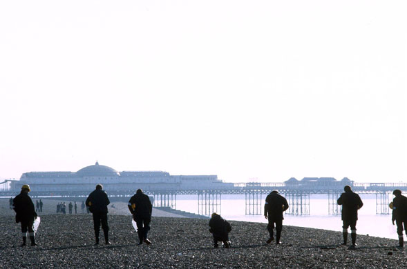 Brighton bombing 1984: Police officers search Brighton beach for evidence