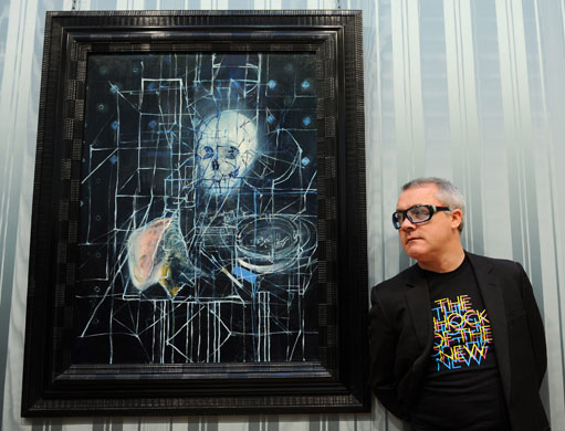 Damien Hirst No Love Lost: Damien Hirst poses with Skull with Ashtray, Cigarettes, Lighter and Shell