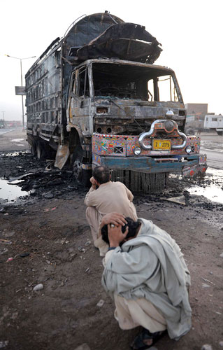 Pakistan: 9 October 2009: The wreckage of a burnt out NATO supply truck