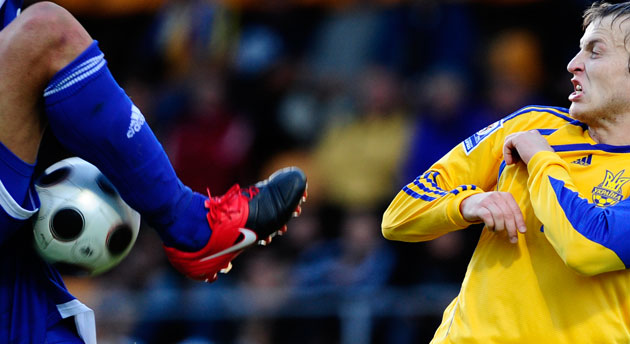 world cup qualifiers: Ukraine's Oleg Gusiev shys away from a high flying Andorran boot 