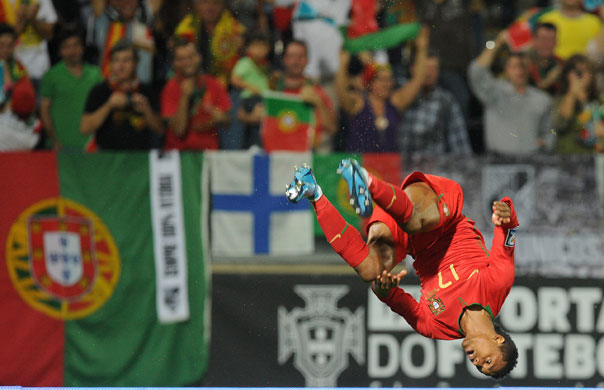 world cup qualifiers: Portugal's Luis Nani goes airborne as he celebrates scoring against Malta