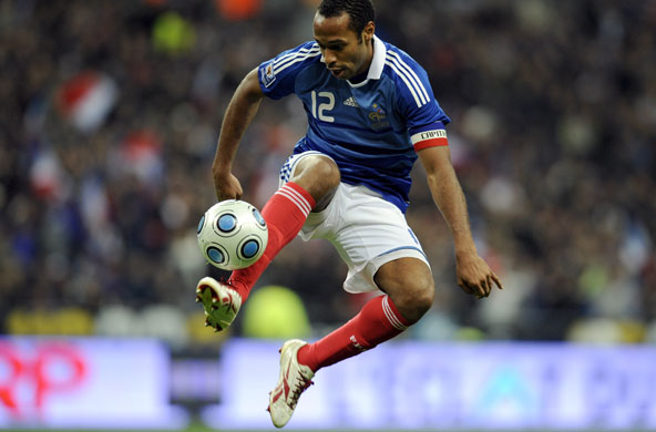 world cup qualifiers: Thierry Henry controls the ball