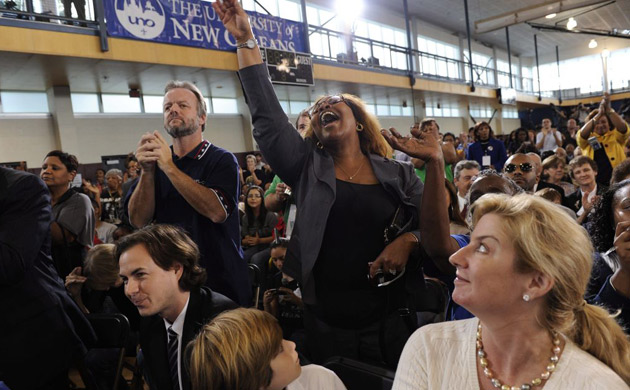 A woman yells 'I love you' as Obama speaks during a town hall event at the University of New Orleans