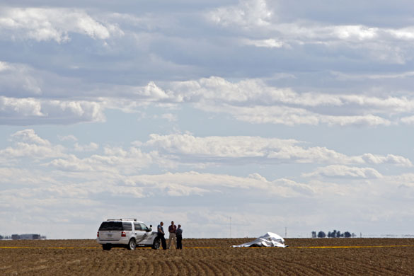 Balloon boy: Investigators are seen at the scene where a balloon landed