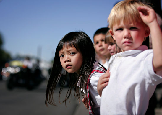 24 hours in pictures: A crowd lines West Arrington Street to pay tribute to a fallen soldier
